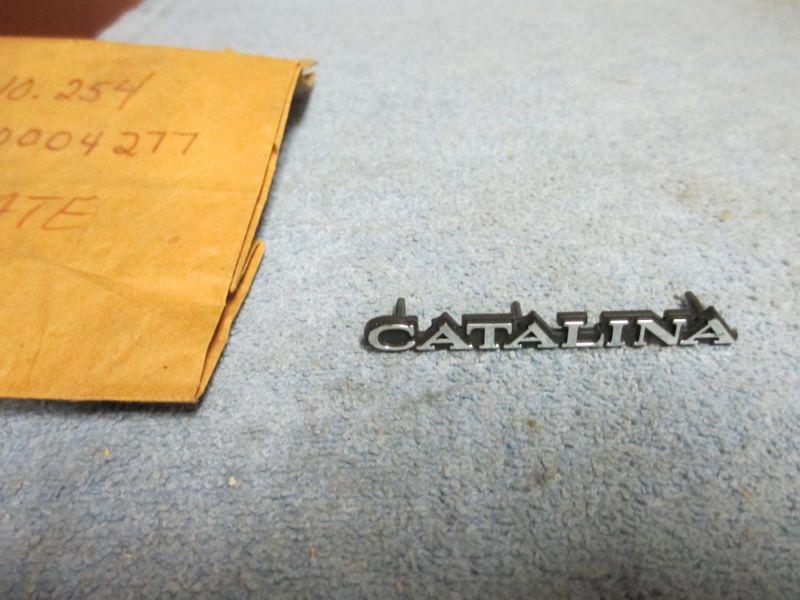 1977-1978-1979-1980-1981 pontiac catalina dash emblem nos 527056 / 10004277 new 