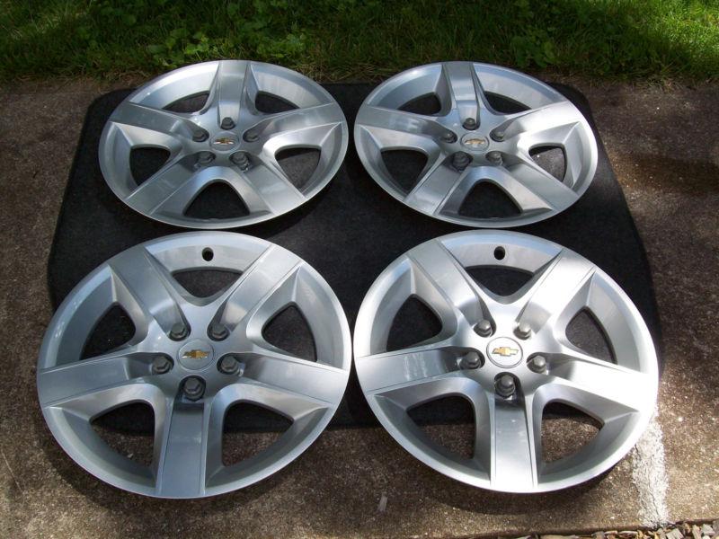 Malibu hubcaps set of four 17 inch oem 2008 to 2012  