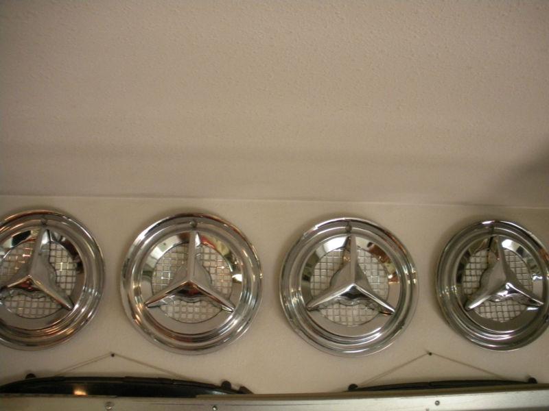 14 inch 1950's vintage j.c. whitney flipper hub caps
