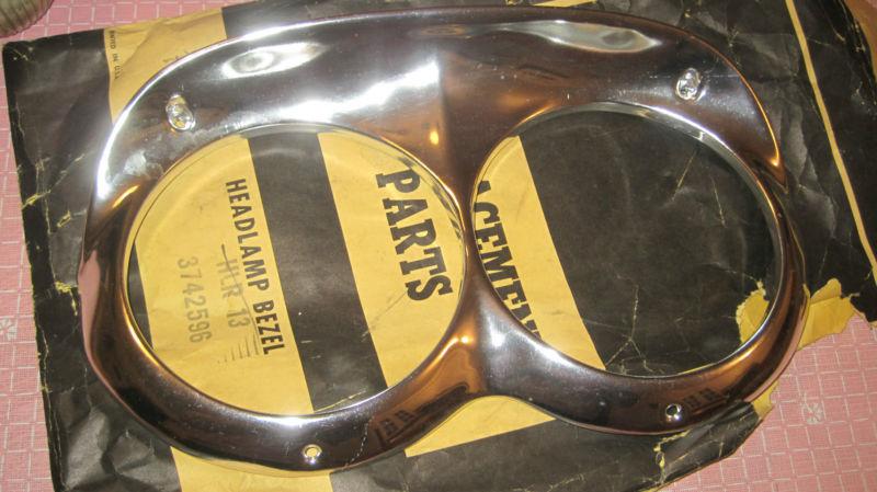 Nors 1958 chevrolet impala, belair right/left headlamp bezel-part no. 3742595