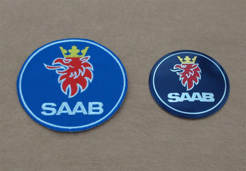 Set of 2 saab items, embroidered saab badge 3.0" & saab logo alloy badge, mint!