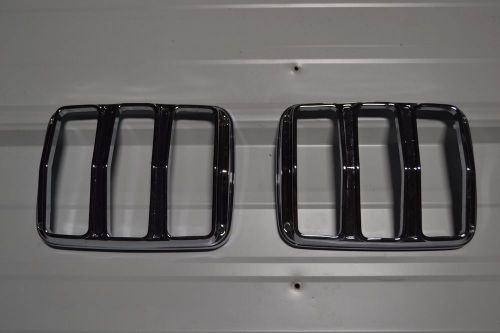 65 66 mustang shelby original rechromed tail light door bezels