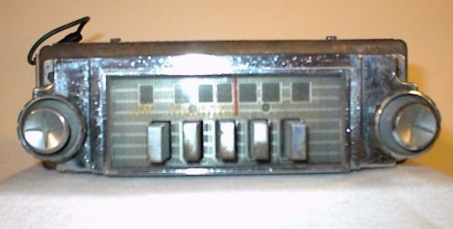 Vintage unknown automatic transistor 12v am push button radio (not able to test)