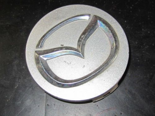 Mazda original equipment wheel center cap oe# 37190         2 inch dia
