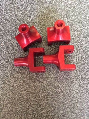 Red fuel rail hold down