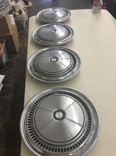 Set of 4 vintage 1980s chrysler corporation 16&#034; hubcaps