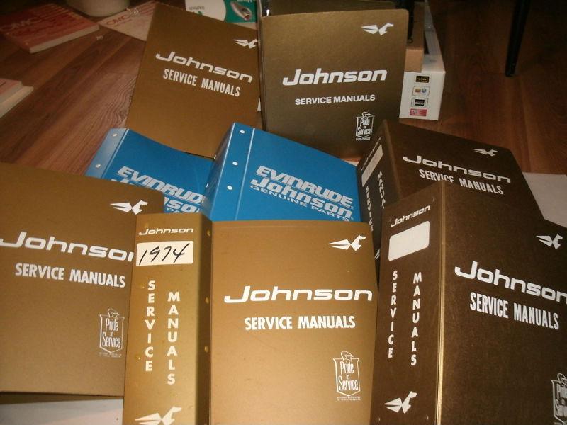 Lot of 7 empty johnson outboard service manual binders