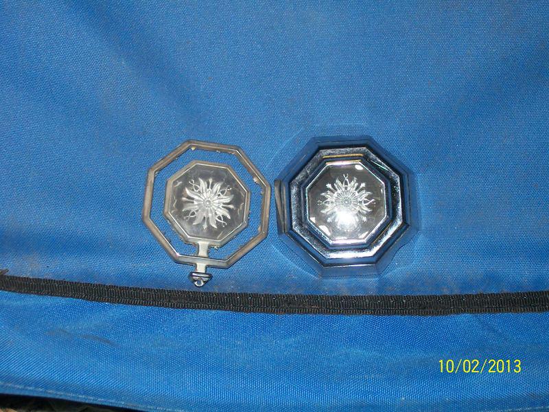 Pontiac trunk lock cover and hood ornament emblem's 2 piece decent matching set!