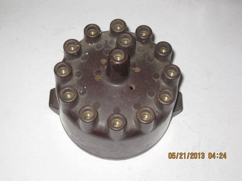 Nos delco remy distributor cap 6,12 cylinder dual ignition,3 inches tall,4 in id