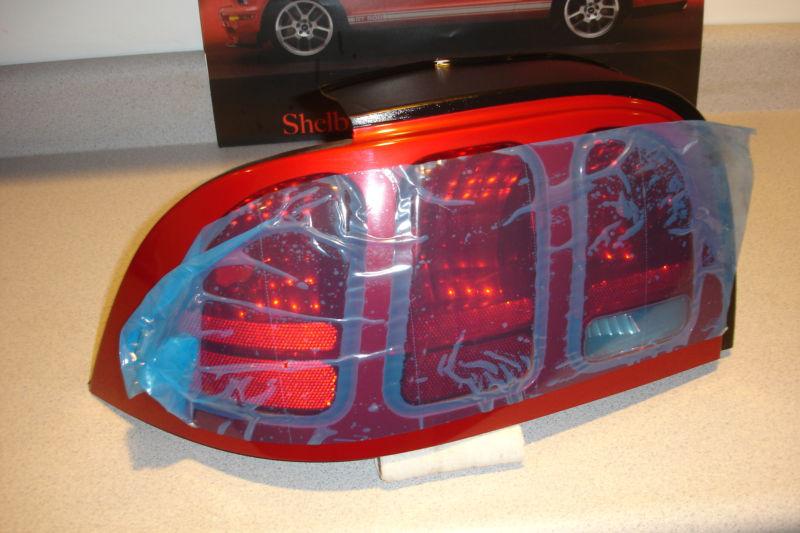 96 97 98 ford mustang driver left rear taillight assembly nos laser red