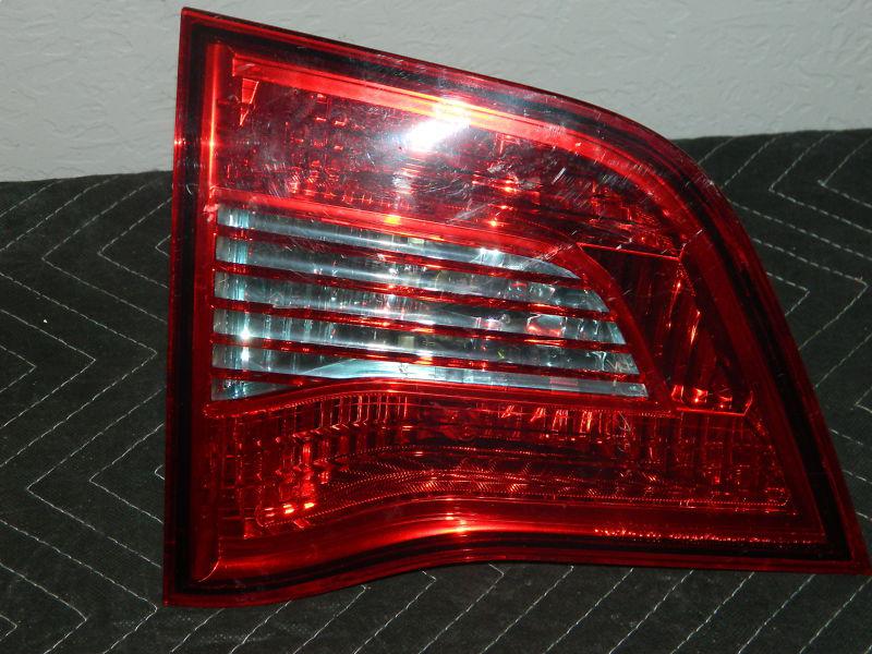 Oem 2009-2012 volkswagon routan left / driver side tail light assembly