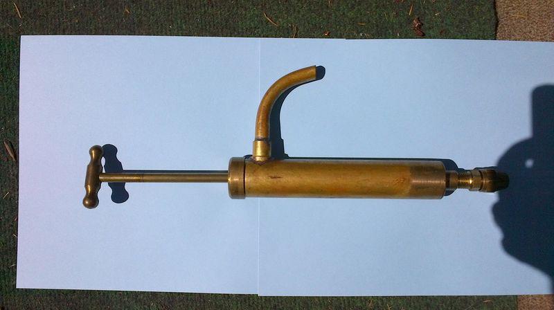 Old brass marine hand pump for boat