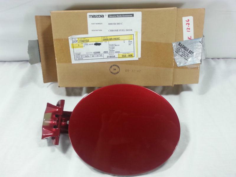Mazda chrome fuel door part number 0000-8r-h03-c new!!! genuine accessory - red