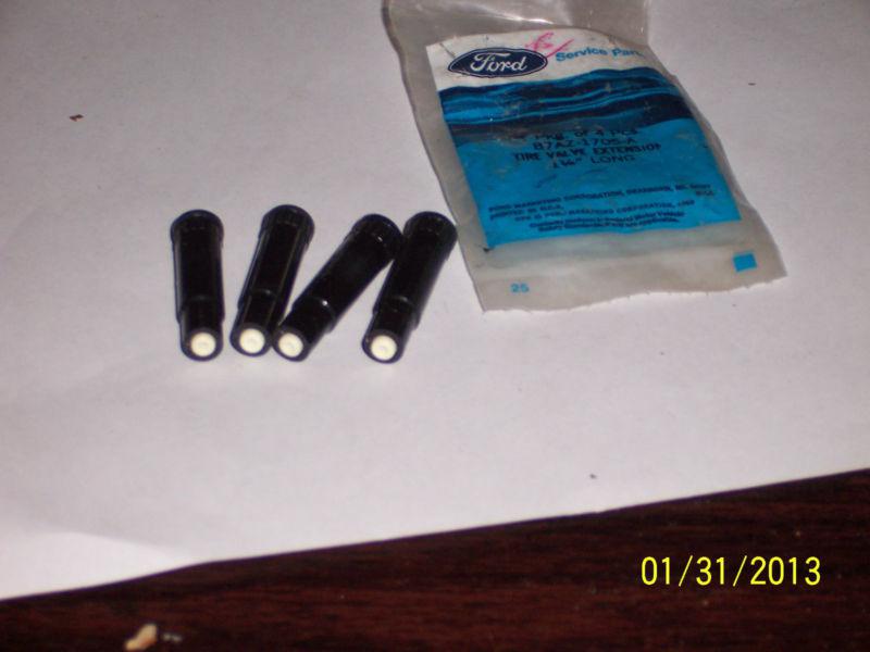 1957 ford car nos tire valve extensions  part # b7az-1705-a (4 of them)