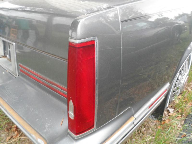 1988 cadillac coupe deville right taillight and housing 