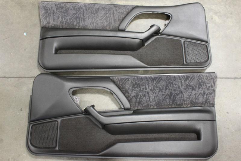 93-02 camaro ebony black cloth door panels used pair oem