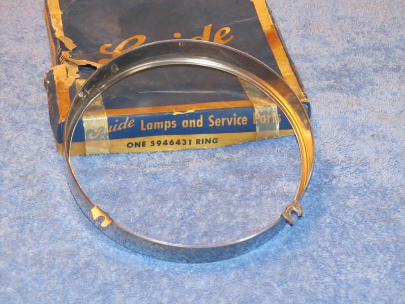 Nos 1955 chevy olds pontiac headlight ring 5946431 gm guide