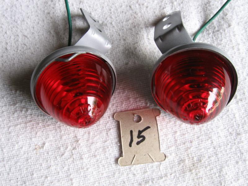 2 red cone shape clearance lights