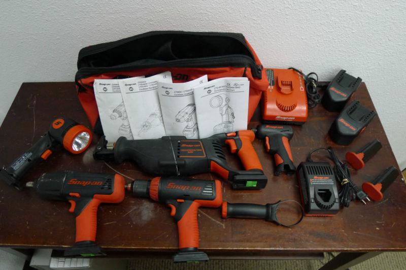 Snap on 5 pc power tool set with 4 batteries and bag impact, drill, saw, light'
