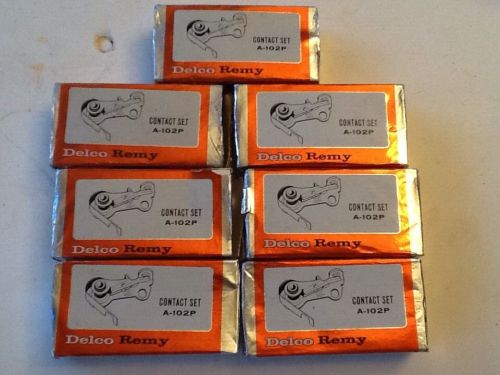 Lot of 7 nos delco remy ignition contact points set a -102  p #. 1944374