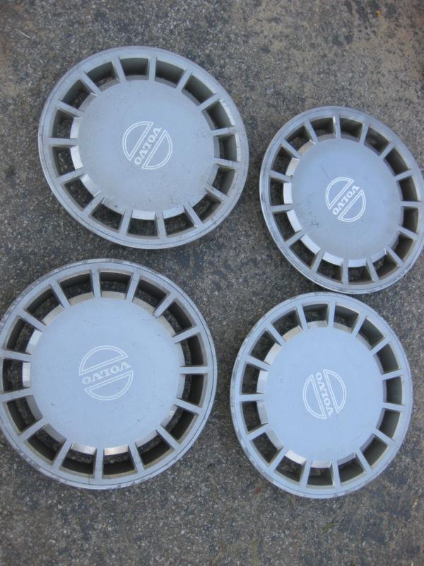 Oem volvo set of 4 hubcaps 15" for steel wheels #1392530 1125
