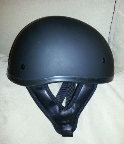 Large flat black motorcycle helmet 