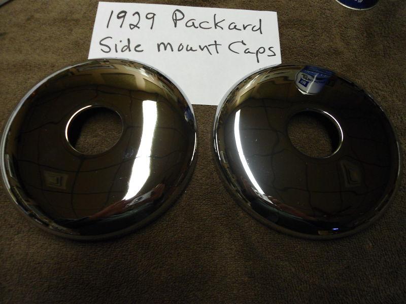 1929 packard side mount hubcaps 