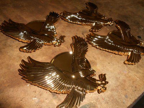 ( 4  )nos vintage  luxor gold  eagle  spinners,   set of four