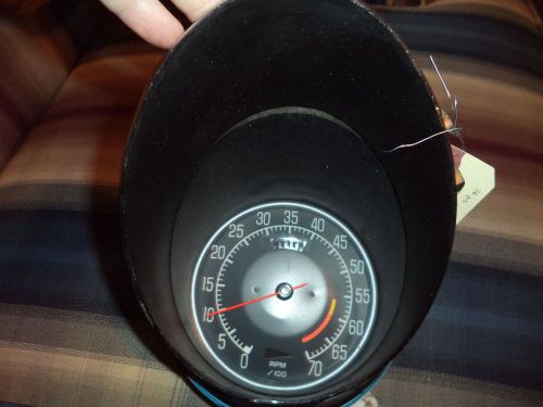 1975-1977 tachometer housings and lens included