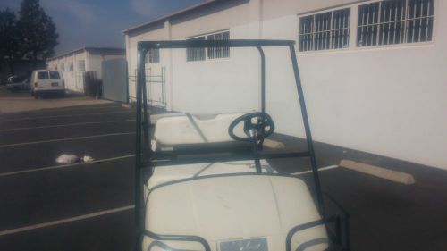 4 passenger ezgo txt black roll cage white rear cushions golf cart