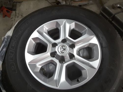 Set of 4 2016 4runner rims with rires and centercaps.
