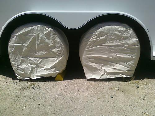 Set of four new wheel tire covers for use on rv, trailer, truck, or car