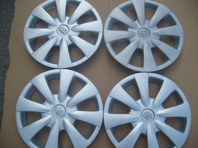 Four 15" toyota corolla 2009 - 2012 oem hub cap wheel covers 570-61147