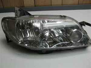 2002 protege passenger rh head light lamp oem