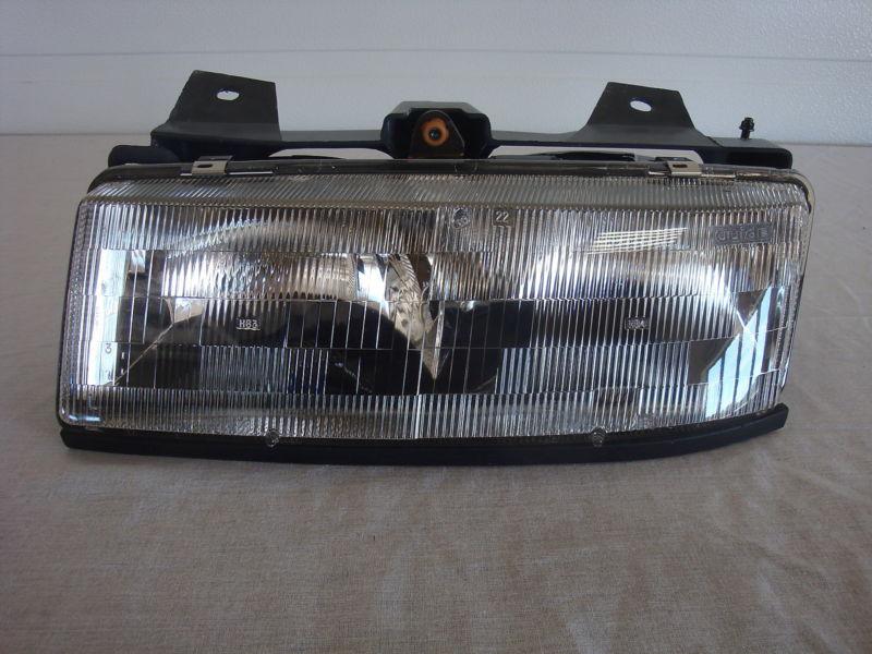  nos oem chevrolet corsica  headlight headlamp 1990 - 1996 left side 