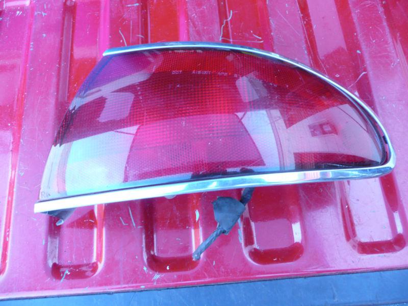 97-98-99-00 01 02 03 04 05 century right or passenger side. tail light qtr mtd 