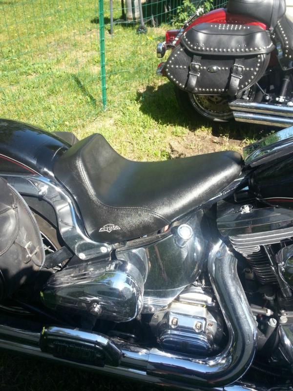 Harley davidson softail ultima black leather seat 99" and down.