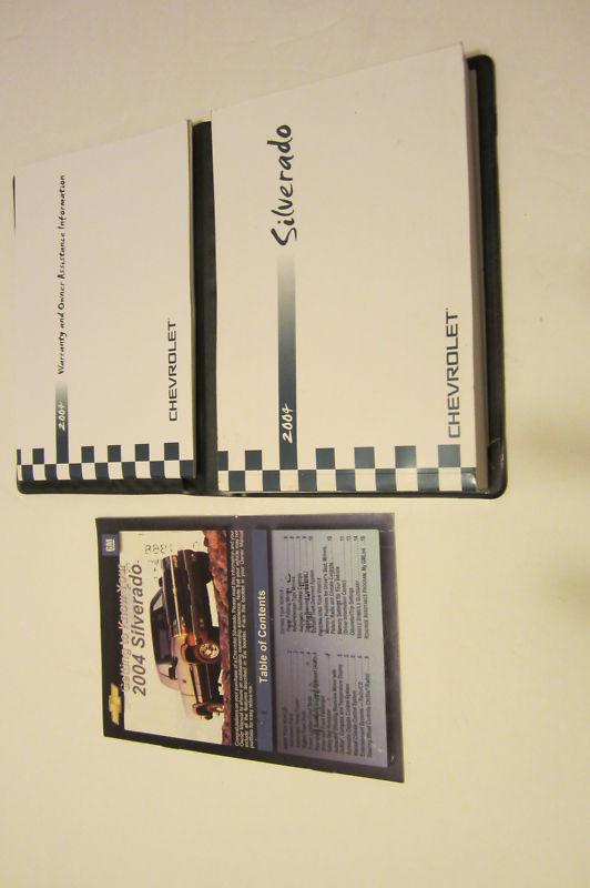 2004 chevrolet silverado owner's manual set with black chevrolet factory case.