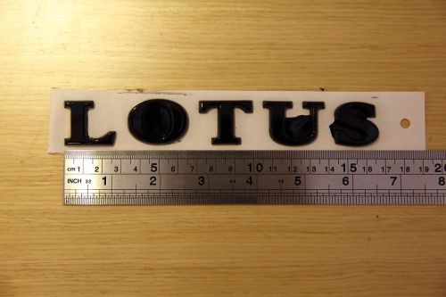 Lotus lettering letters rear badge emblem raised black