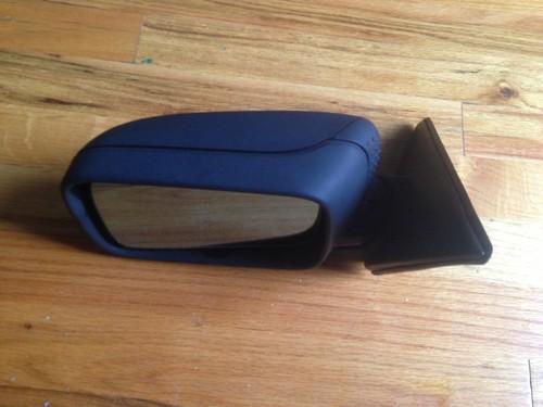 92-98 bmw e36 318/323/325/328 right side power mirror oem.