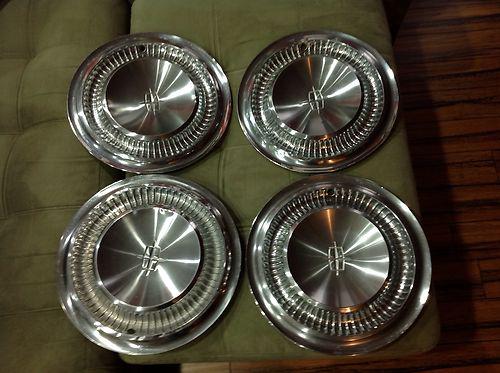 1965 lincoln continental 4 hubcaps