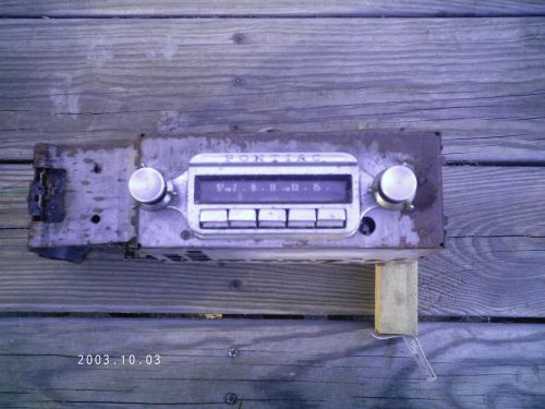 1959 1960 ?  pontiac fatory radio for parts not working, interior dash trim