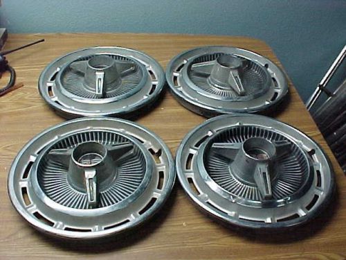 Vintage set of 4 chevy ss spinner hub caps