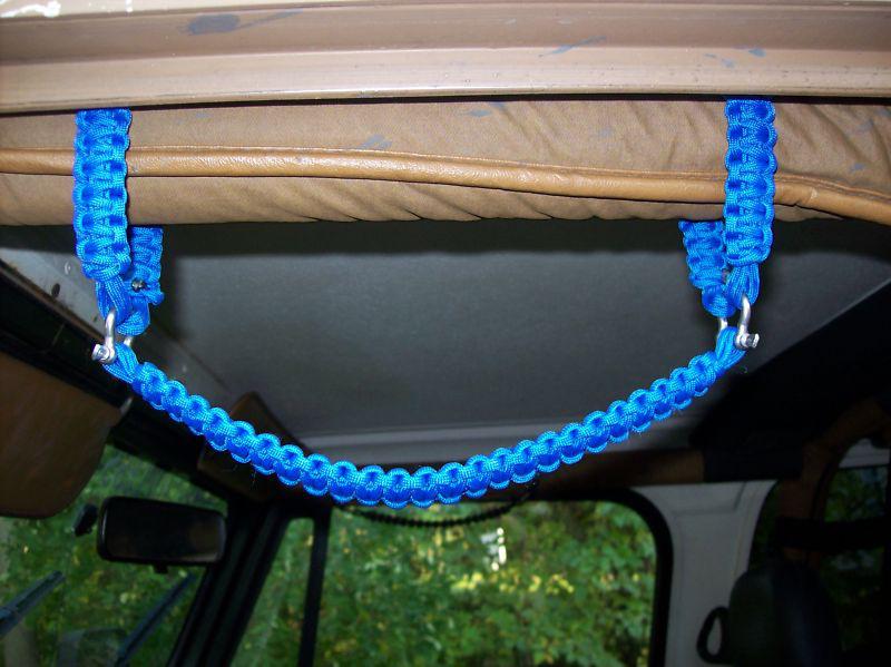 Jeep wrangler roll bar paracord grab handles with d - rings