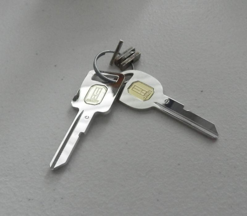 1989 cutlass supreme silver keys uncut and tumblers 