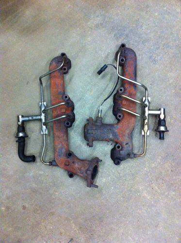 Chevy 305/350 engine exhaust manifold with smog tubes