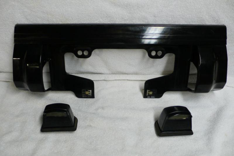 Rear license plate light and trim,molding 84 85 86 87 corolla gt-s 