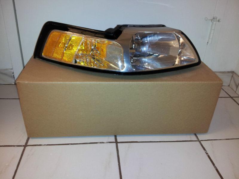 99-04 ford mustang original clear headlamp passenger side in mint condition!