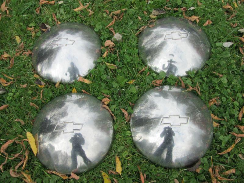 Chevy baby moon hubcaps, set of 4 used on malibu, nova, el camino 