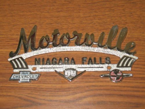Vintage motorville chevy olds cadillac  metal auto dealer emblem nameplate